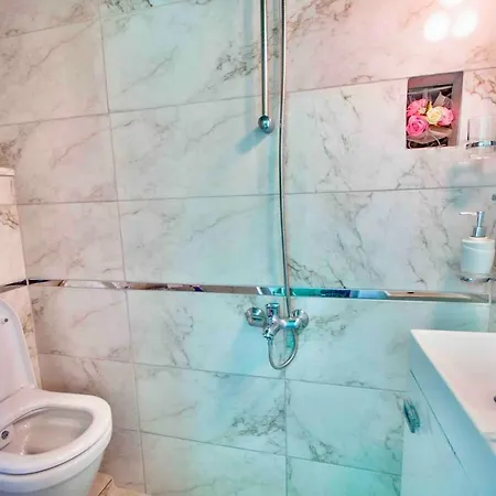 House With Blue Balcony *